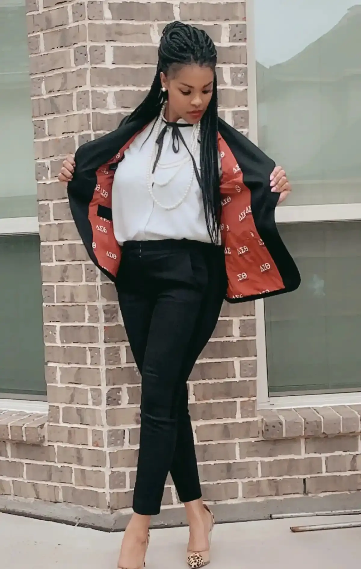 Woman using an opened black suit