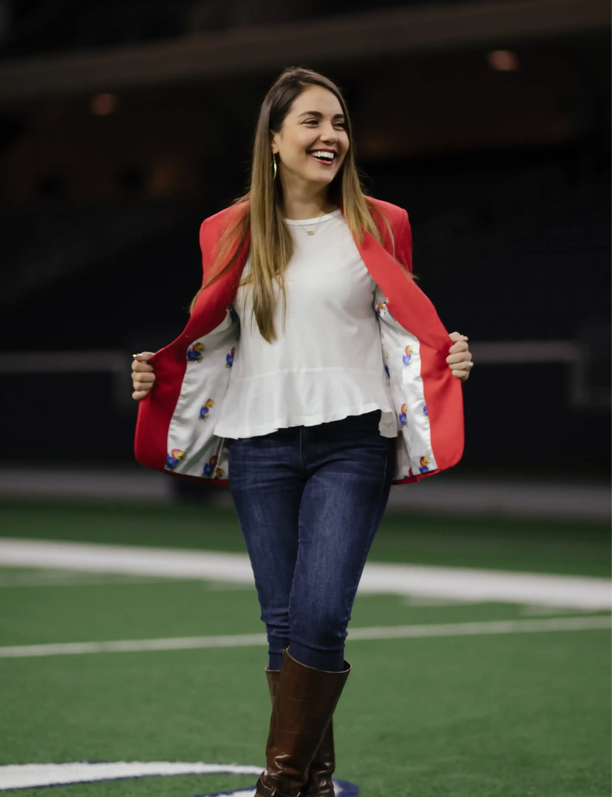 Woman using an opened red suit