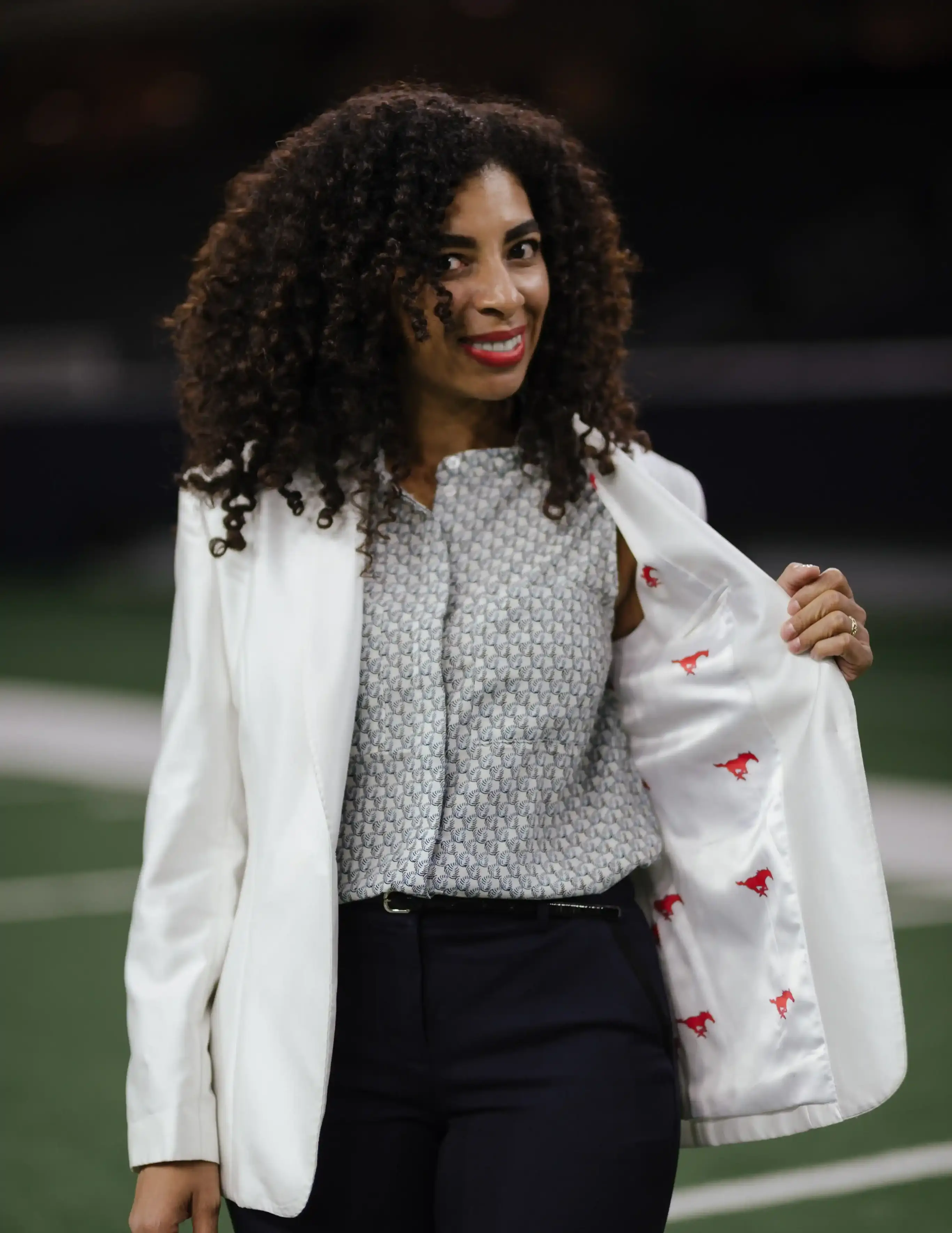 Woman using an opened white suit